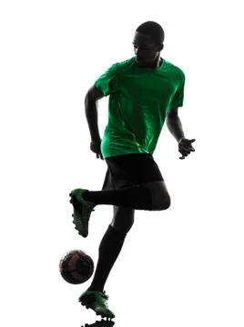 African man soccer player  silhouette Stock Photos