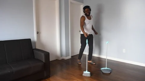 African man sweep Stock Footage 128849522