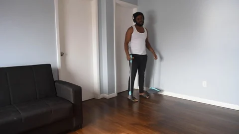 African man sweep Stock Footage 128849592