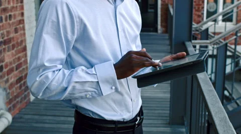 African man using digital tablet Stock Footage 53082189