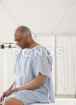 African man waiting for doctor in hospital Stock Photos