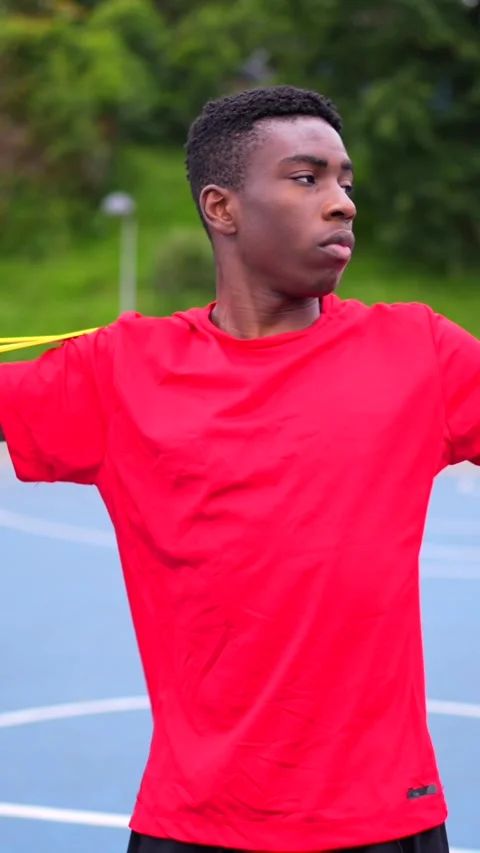 African man warming up and stretching in a basketball court Stock Footage 284838604