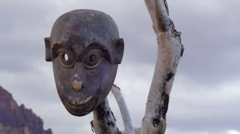 African Mask Primitive in Wilderness with Pan Stock Footage 34804318