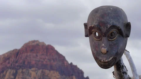 African Mask Primitive in Wilderness with Pan Stock Footage 34804655