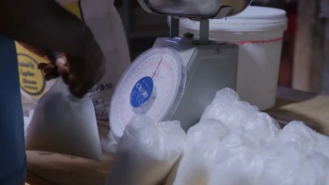 African measuring sugar for bread making 動画素材 157430476
