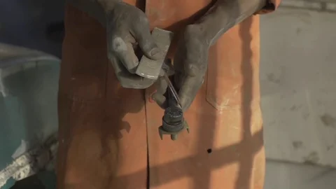 African mechanic, holds tools, medium shot. Video stock 82329521