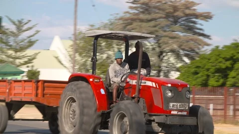 African men in a tractor Stock Footage 129291344