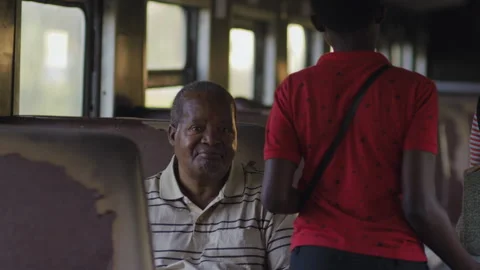 African old man on a moving old train, Tanzania Africa Stock Footage 132224784