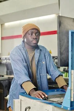 African operator working at computer machine Stock Photos
