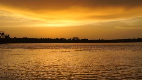 African orange river at sunset Stock Footage 102404579