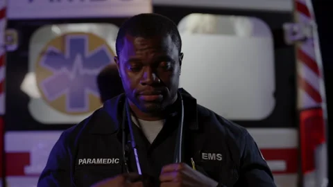 African paramedic with stethoscope on neck posing on street Stock Footage 164282095