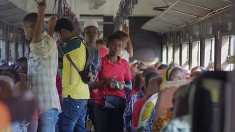 African passengers on a moving old train, Tanzania Africa Stock Footage 132539596