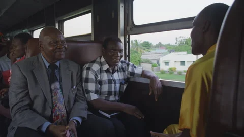 African passengers talking on a moving old train, Tanzania Africa Stock Footage 132228261