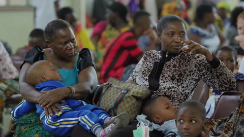 African passengers waiting for the train in the waiting room of the station. Stock Footage 132120287