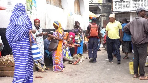 African people in local street food market, Zanzibar, Tanzania, Africa Stock Footage
