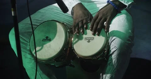 African playing bongo drums.mp4 Stock Footage 49292523