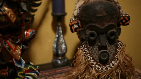 African Primitive Mask with Tracking Light Stock Footage 33741526