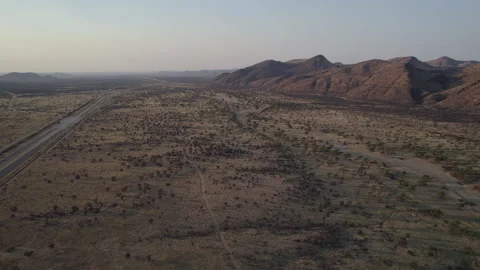 African savannah at sunset with mountains in the background Stock Footage 264020022
