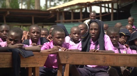 African School Children Taking Notes in Kabale, Uganda Stock Footage 40927383