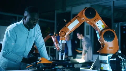 African science worker is digitally operating a robot Video stock 146772287