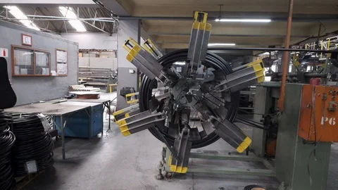 African stock video of machine rolling and bending pipe Video stock 117690156