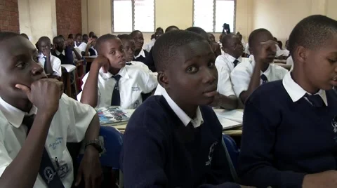 African students at school,raising hand to answer a question-Education in Africa Stock Footage 58993918