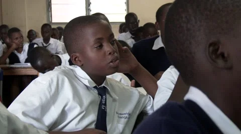 African students studying at school -responding to teacher - Education in Africa Stock Footage 58993973