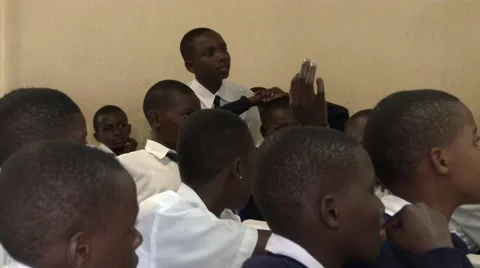 African students studying at school -responding to teacher - Education in Africa Stock Footage 58994024