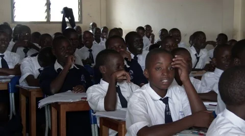 African students studying &amp; talking crowded classroom at school-Education Africa Video stock 58993799