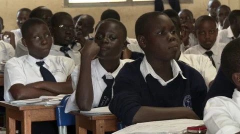 African students studying in a very crowded classroomat school-Education Africa Stock Footage 58994110