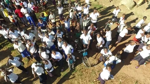 African students watching a drone Stock Footage 158804178