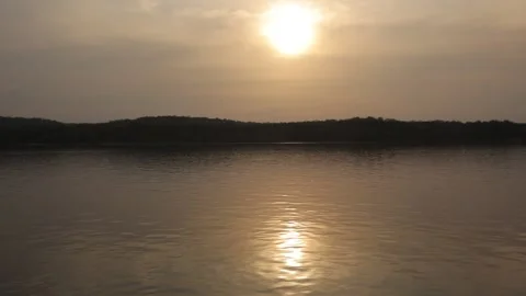African sunset, sun going down over the river, view from the boat, golden hour 스톡 동영상 208048398