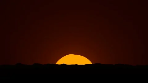 African sunset time lapse with big sun and cloudless sky. Stock Footage 239254261