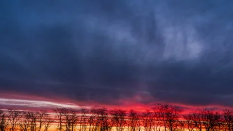 African sunset time lapse with big sun and backlit clouds. Cinematic 4k footage. Stock Footage 274548054