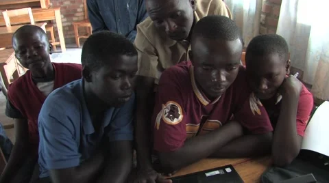 African Teachers And Students Using Computer In A Class In Rwanda Stock Footage 53089603