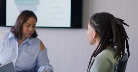 African team at work, blazer speaker speaking, showing funnel, woman reaching Stock Footage 345820372