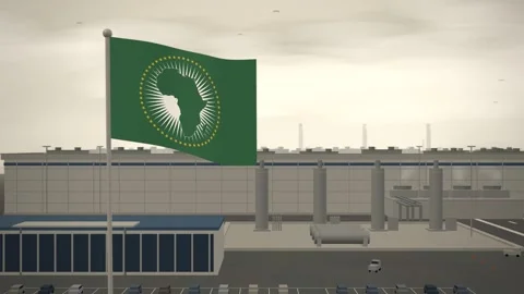 African Union Flag Flying Over Semiconductor Fabrication Plant Cleanroom Stock Footage 344783201