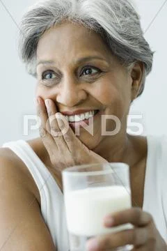 African Woman Drinking Milk