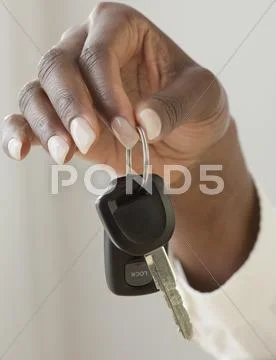 African woman holding car keys Stock Photos