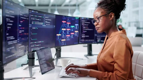 African Woman Programmer Developing Software For Web Stock Footage 328402375