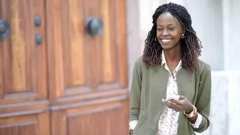 African woman using mobile phone Stock Footage