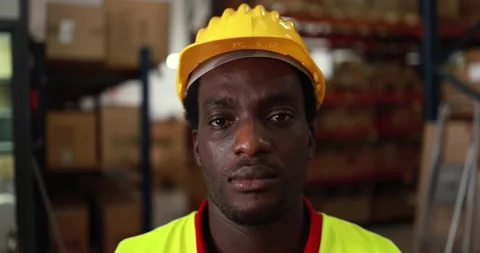 African worker man inside delivery boxes warehouse Stock Footage 145434539