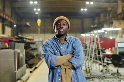African worker standing in factory Stock Photos