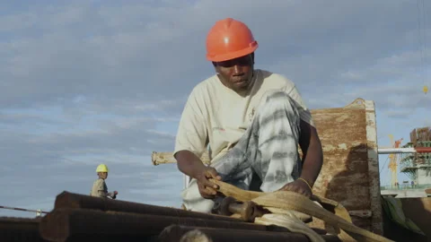 African worker working on construction site, Tanzania，Africa. Stock Footage 133121196