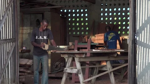 African working in a sawmill Stock Footage 158804353