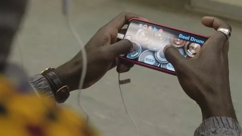 African young man hands playing on the phone. Fast rhythm  Stock Footage 102437892