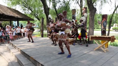 Africans perform African dance in front of park visitors, Beijing World Park Stock Footage 51744511