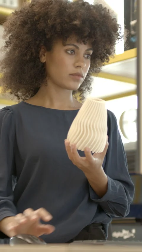 Afro American Female technician engineer working with 3D printer model Stock Footage 213610755