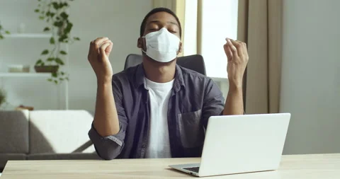 Afro american man young freelancer office worker in protective medical mask Stock Footage 142377862