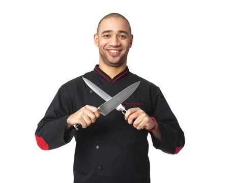 Afro American professional cook holding knifes - isolated. Stock Photos